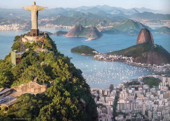 A view of the city from above with christ statue.