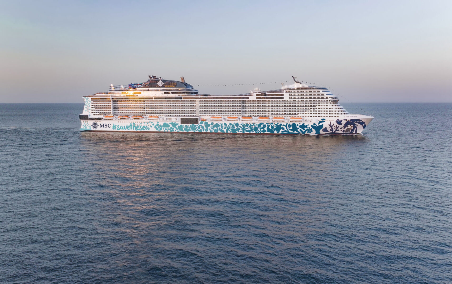 A large cruise ship is in the water.