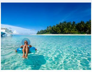 Woman relaxing in a tropical lagoon.